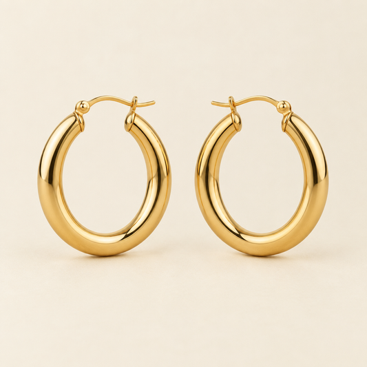 Classic gold hoop earrings concept